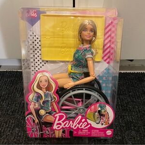 Brand new Barbie with a wheelchair and ramp